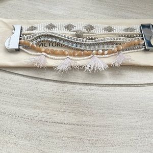 White Victoria Emerson bracelet. Elegant mix of stones, crystal with tassels